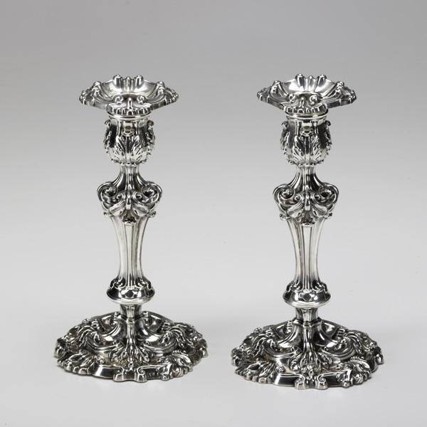 PAIR OF SILVER CANDLESTICKS: PAIR OF SILVER CANDLESTICKS; By John Watson, Sheffield, 1815; Knopped columns with broad acanthus and scroll ornaments; 8 1/4''