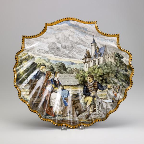 FRENCH FAIENCE PLATTER: FRENCH FAIENCE PLATTER; Shell-shape, footed, 19th c.; Artist signed illegibly; 14'' x 15''