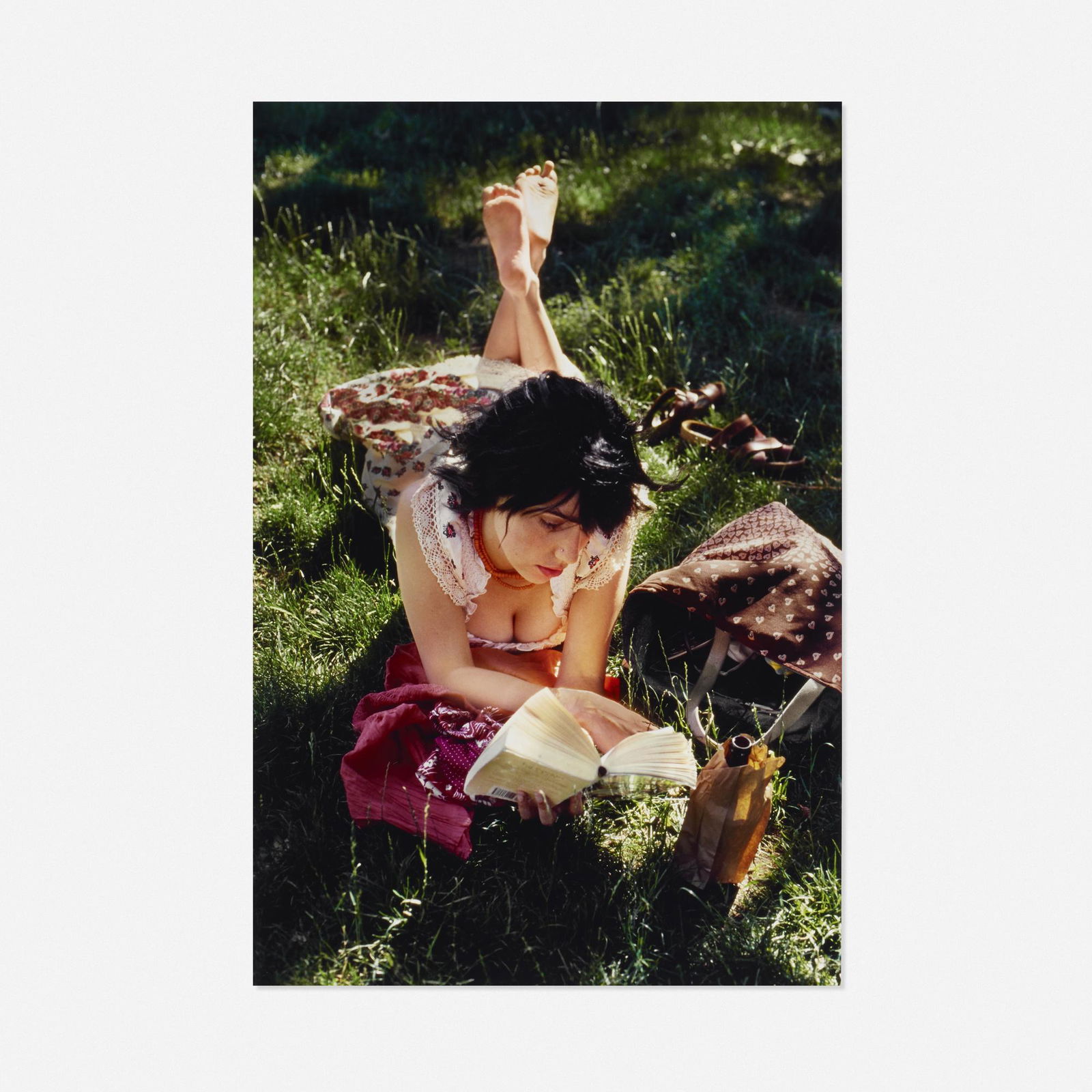 Steve McCurry, Girl Reads in Grass: Steve McCurry Girl Reads in Grass 2017cibachrome print sheet: 24 h × 20 w in (61 × 51 cm) image: 21.25 h × 14.25 w in (54 × 36 cm) Signed, dated, numbered and inscri