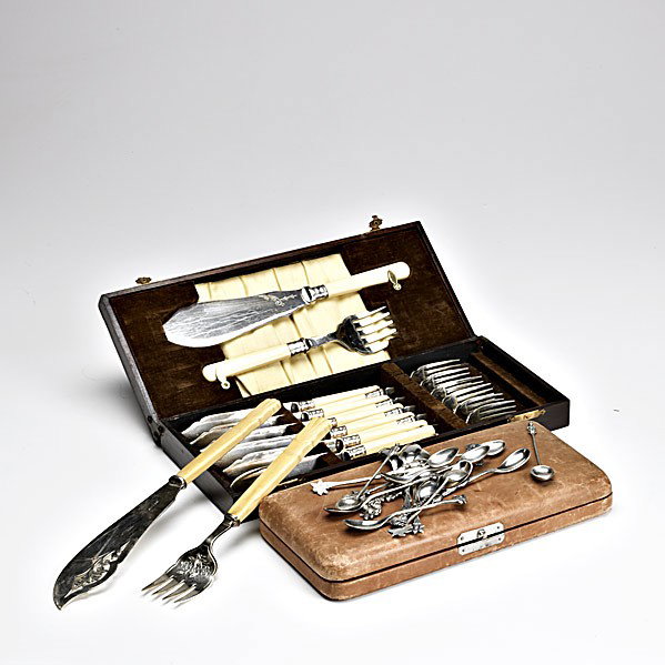 SILVER AND SILVER PLATE: SILVER AND SILVER PLATE; Cased set of twelve Whiting & Co. sterling fishforks, cased set celluloid handled silver plate fish service for six, ivory handled silver plate fish serving knife and fork and