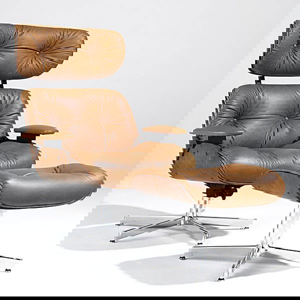 STYLE OF CHARLES EAMES / SELIG: STYLE OF CHARLES EAMES; SELIG; Walnut lounge chair and ottoman; Paper labels; Chair: 41'' x 33'' x 32'', ottoman: 17'' x 21'' x 17''