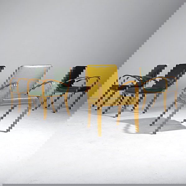 GILBERT ROHDE (Attr.) / HEYWOOD WAKEFIELD: GILBERT ROHDE (Attr.); HEYWOOD WAKEFIELD; Set of four armchairs with vinyl upholstery; Three with Heywood Wakefield paper label; 33 1/2'' x 21'' x 22''