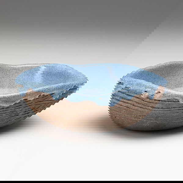 STYLE OF GLEN LUKENS: STYLE OF GLEN LUKENS; Earthenware bowl, thick blue drip glaze with heavy craquelure; Spurious mark; 2 1/4'' x 6''