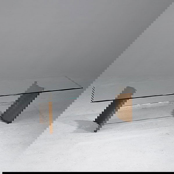 VLADIMIR KAGAN / SELIG: VLADIMIR KAGAN; SELIG; Compass table in walnut and chrome steel with plate glass top; 15'' x 25'' x 60''