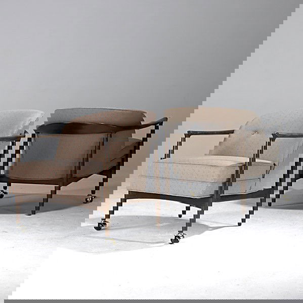 POUL JEPSON (Attr.) / SELIG: POUL JEPSON (Attr.); SELIG; Carved teak lounge chairs with wool upholstery, front legs on casters; Selig metal label; 26 1/2'' x 30'' x 30''