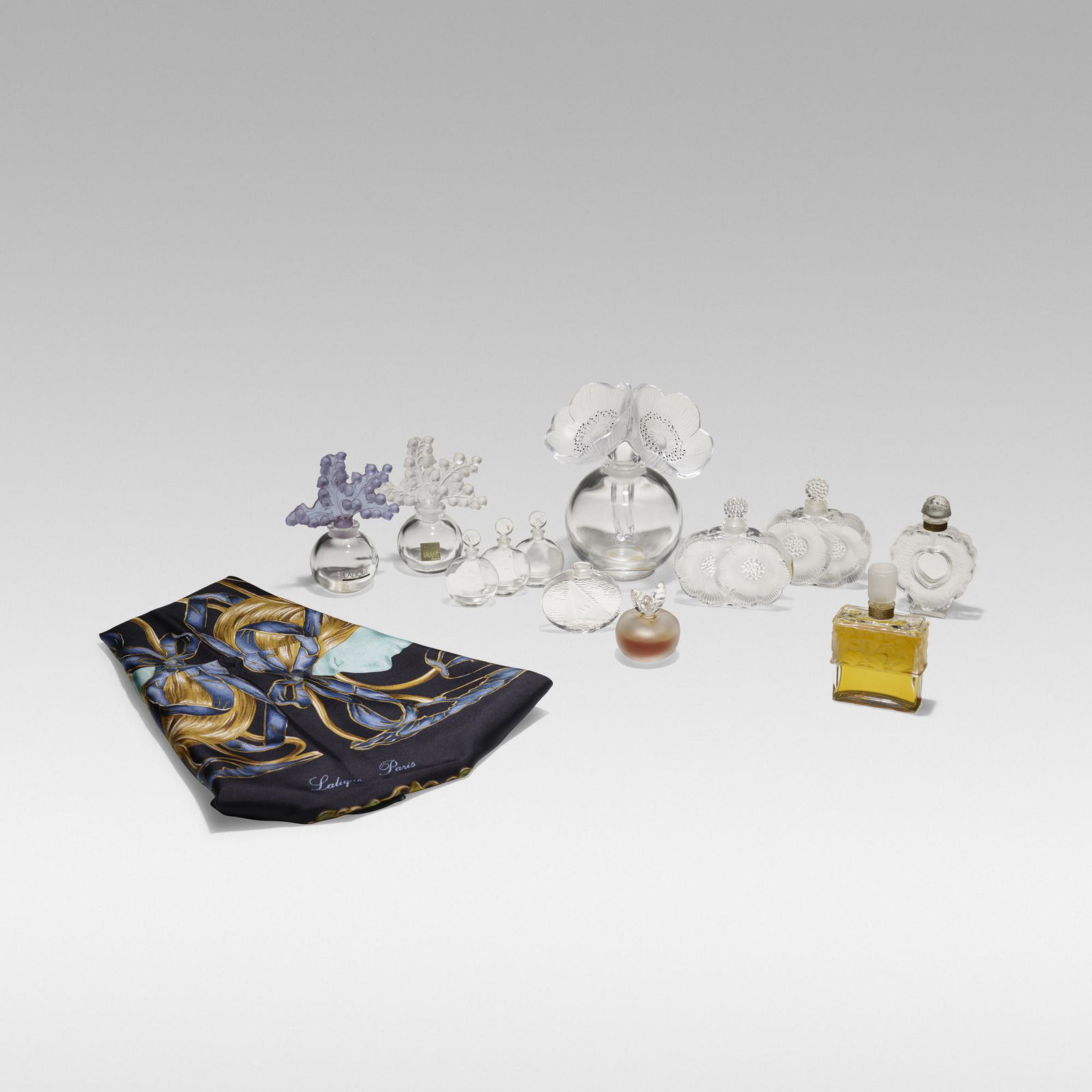 Lalique, Collection of twelve post-war perfume bottles (1 of 3)