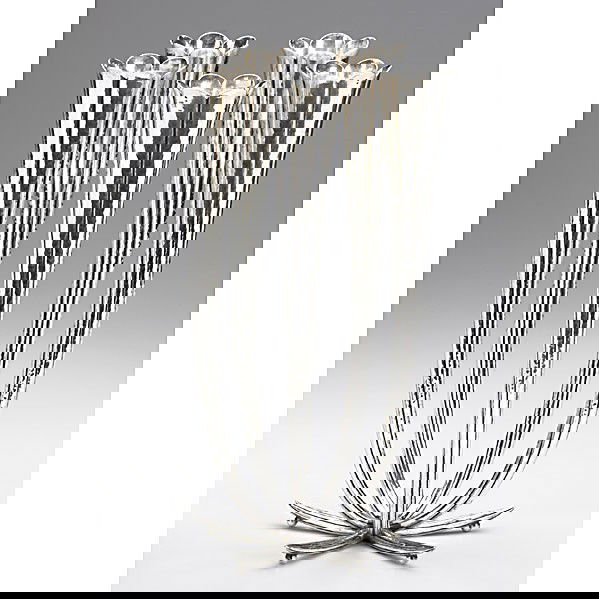 JOSEF HOFFMAN; WIENER WERKSTATTE; Candelabrum: JOSEF HOFFMAN; WIENER WERKSTATTE; Hammered sterling five branch seaform candelabrum; Stamped WIENER WERKSTATTE MADE IN AUSTRIA JH 900; 12 1/2'' x 7 1/4''