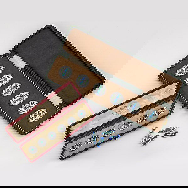 LIBERTY & CO.; LIBERTY STYLE; Shirt studs: LIBERTY & CO.; LIBERTY STYLE; Two sets of shirt studs, one by W.H. Hasler, Birmingham, 1904, the other by Patriz Huber for Theodore Fahrner and Murle Bennett & Co.; Both in original boxes; Pair of new