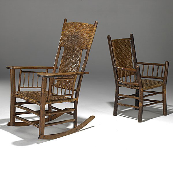OLD HICKORY; Two chairs: OLD HICKORY; Tall paddle-arm rocker and armchair with matching woven split reed; Both branded Old Hickory Chair Co. Martinsville Indiana; Rocker: 45'' x 29 1/2'' x 32'', chair: 38 1/2'' x 25'' x 19''