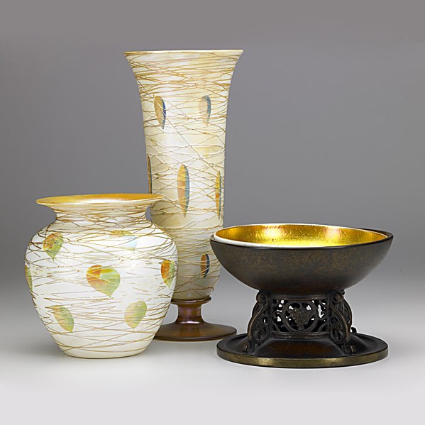 DURAND; OSCAR BACH; Two Durand art glass vases: DURAND; OSCAR BACH; Two Durand art glass vases, gold threading over leaves; Oscar Bach bronze footed vessel, grape motif, gold art glass liner, possibly Steuben; Vases signed DURAND and numbered 1710-