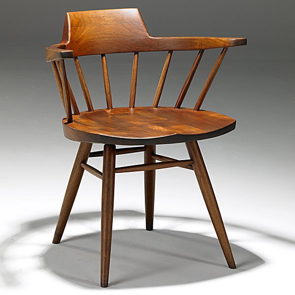 GEORGE NAKASHIMA; Captain's chair: GEORGE NAKASHIMA; Black walnut Captain's chair, ca. 1962; Provenance: Toby Royston, Folly Cottage, Exton, PA, copy of original invoice available; Unmarked; 28 1/2'' x 24'' x 20''
