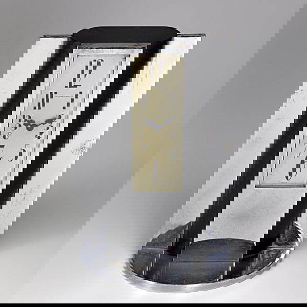 MAPPIN & WEBB; French Art Deco clock: MAPPIN & WEBB; Nickeled brass and enameled steel French Art Deco clock, 1930s; Clock face signed THE WEBB C. BALL Co. FRANCE; 10 1/2'' x 6 1/2'' x 4 3/4''