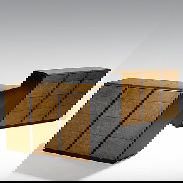 GILBERT ROHDE; HERMAN MILLER; Rare dressers: GILBERT ROHDE; HERMAN MILLER; Rare and early pair of quilted maple and macassar ebony dressers (no. 3773), 1930s; Foil labels; 34'' x 46'' x 19 1/2''