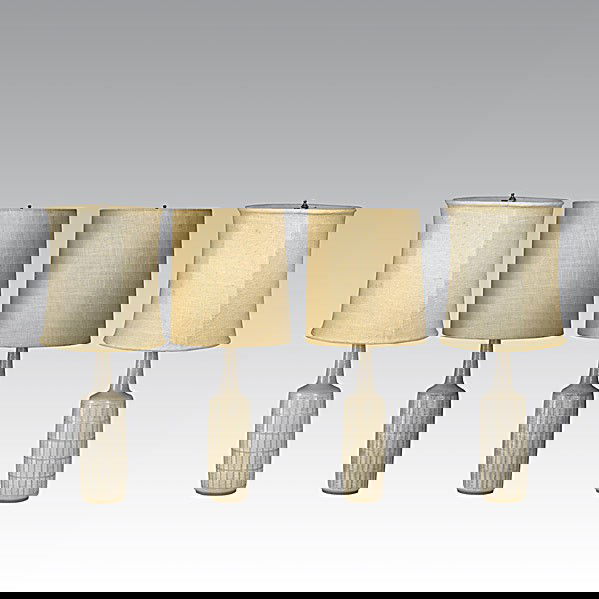 PER LINNEMANN-SCHMIDT; PALSHUS; 2 pairs of lamps: PER LINNEMANN-SCHMIDT; PALSHUS; Two pairs of ceramic lamps with original linen shades; Signatures possibly hidden by original felt; 29 1/2'' x 4 1/2''