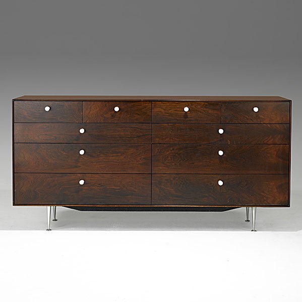 GEORGE NELSON; HERMAN MILLER; Thin Edge dresser: GEORGE NELSON; HERMAN MILLER; Rosewood and aluminum Thin Edge dresser; George Nelson, Herman Miller foil label; 33 1/2'' x 67'' x 18 1/2'', with pulls, 20''