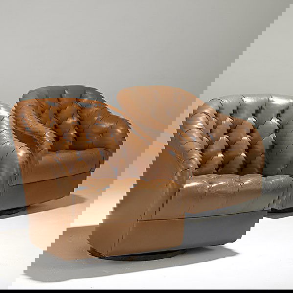 WARD BENNETT; BRICKEL; Pair of club chairs: WARD BENNETT; BRICKEL; Pair of leather and walnut club chairs; Unmarked; Chair: 31'' x 29 1/2'' x 32''