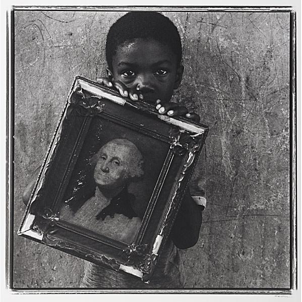 Keith Carter (American, b. 1948) Boy with George W: Keith Carter (American, b. 1948) Boy with George Washington, 1990; Toned gelatin silver print; Signed, dated, titled and numbered 2/50; 20'' x 16'' (sheet); Provenance: Collection of Joshua P. Smith,