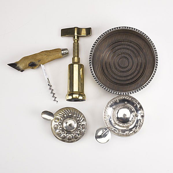 WINE ACCESSORIES: WINE ACCESSORIES; Five pieces, 19th/20th c.: French silver tastevin, silver plate tastevin, silver plate bottle coaster, deer hoof corkscrew, Italian brass corkscrew; Longest: 6''