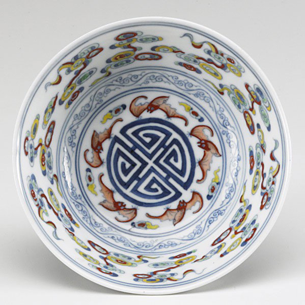 WUCAI DISH: WUCAI DISH; Five Bats (wufu) encircling a stylized shou character, 19th c.; Six character Yongzheng (1723-1735) mark on base; 5'' dia.