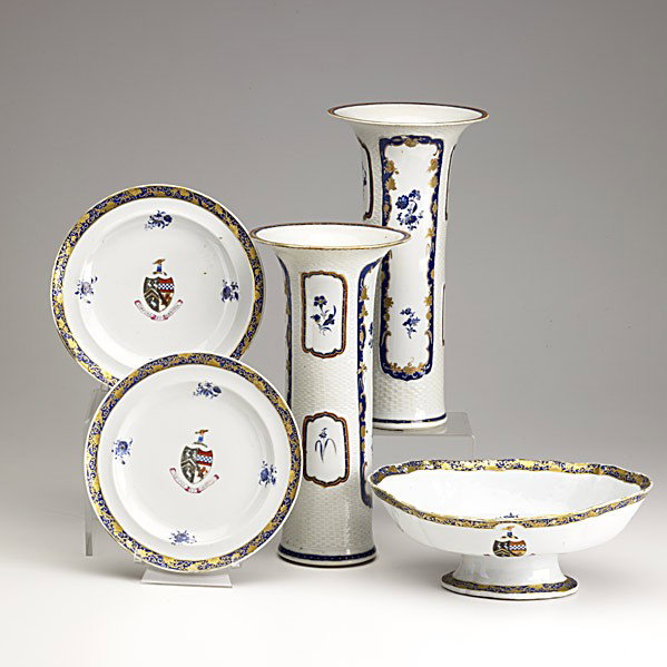 CHINESE EXPORT: CHINESE EXPORT; Pair of beaker vases, oval bowl and two plates with cobalt rims and floral decoration, the bowl and plate with center crest, ca. 1790; Tallest: 11 3/4''