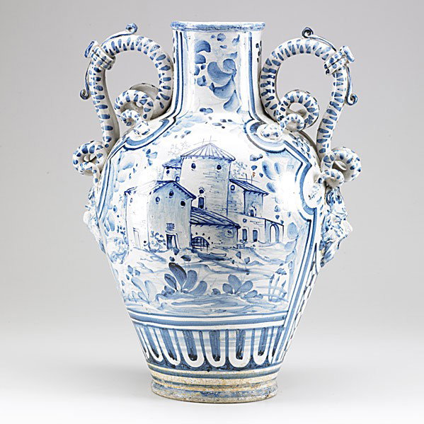 ITALIAN FAIENCE URN: ITALIAN FAIENCE URN; Double handled with mask applique, 19th/20th c.; 19'' x 14'' dia.
