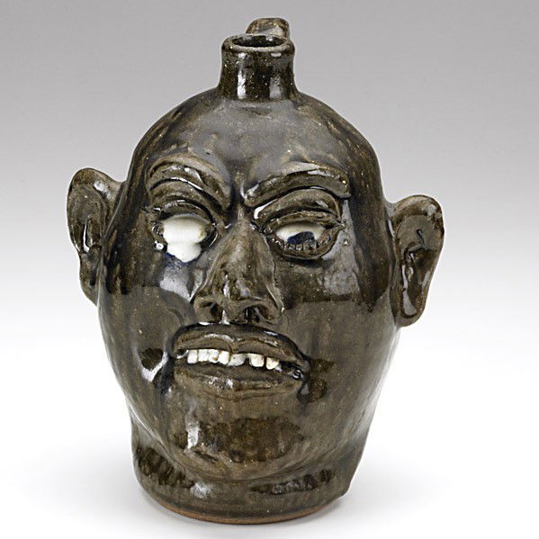 LANIER MEADERS: LANIER MEADERS; Glazed stoneware face jug with clay teeth and eyes; Signed; 10''