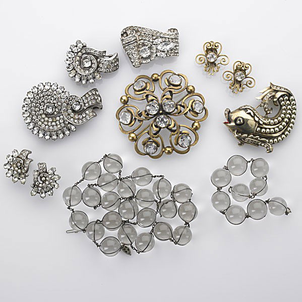 COLLECTION OF VINTAGE COSTUME JEWELRY: COLLECTION OF VINTAGE COSTUME JEWELRY By Eisenberg Originals, Joseff Mazer, etc. Sterling ''diamond'' volute forms by Eisenberg Originals include: Three fur clips and earrings; Joseff ''diamond and go