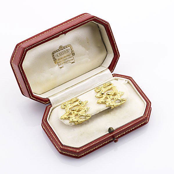 CARTIER MODERNIST 18K EARRINGS: CARTIER MODERNIST 18K EARRINGS London, 1968, textured freeform, clip backs, #116142, small maker mark AG (possibly Grima). Original case. 16 gs., 1''