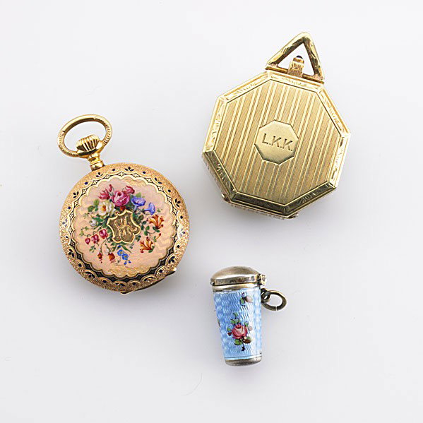 THREE PRECIOUS EDWARDIAN ACCESSORIES: THREE PRECIOUS EDWARDIAN ACCESSORIES 14k octagonal compact; enameled 18k rose gold pocket watch; enameled silver case conceals telescoping cigarette holder. Gold elements 55.5 gs. GW