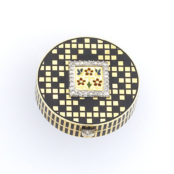 CARTIER ENAMELED GOLD AND DIAMOND PILL BOX: CARTIER ENAMELED GOLD AND DIAMOND PILL BOX 14k, cylindrical, checkered lid with a diamond bordered floral panel, checkered bottom, striped edge. Marked Cartier and numbered 3903, 2044. 15.4 gs., 1 1/1