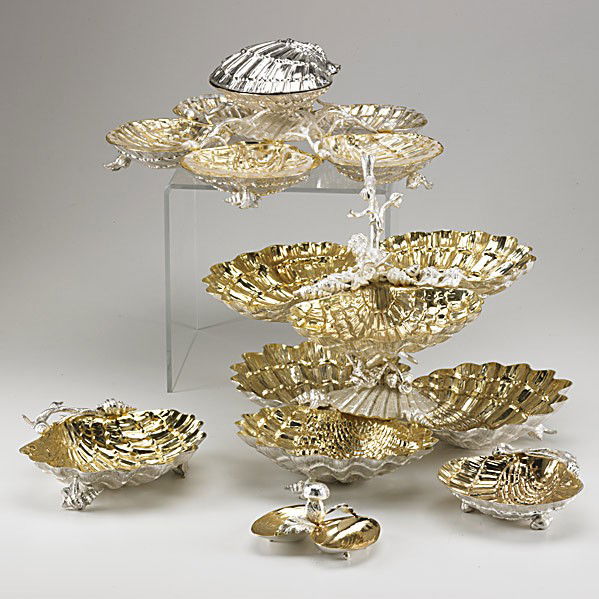 FRANCO LAPINI SILVERPLATE TABLEWARE: FRANCO LAPINI SILVERPLATE TABLEWARE 20th C. Italian Rococo, 22 pieces: (2) tiered sweetmeat servers with interconnected seashell design, (2) condiment trays, (8) salt cellars, (6) three-footed clamshe