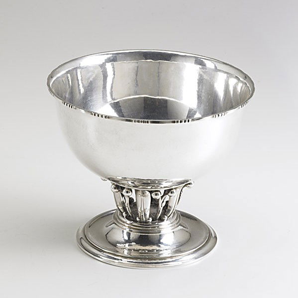 GEORG JENSEN SILVER ''LOUVRE'' BOWL: GEORG JENSEN SILVER ''LOUVRE'' BOWL Designed by Georg Jensen in 1912. #19A, Denmark, post-war. 26 OT, 6 1/2'' x 7 3/4''. Note: The original spot-hammered centerbowl with leaf and berry column is in th