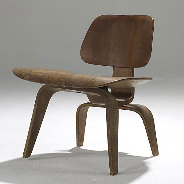 CHARLES & RAY EAMES/ HERMAN MILLER: CHARLES & RAY EAMES; HERMAN MILLER; Walnut LCW, ca. 1950; Unmarked; 25'' x 22'' x 24''