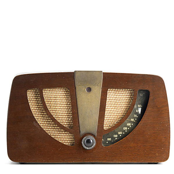 CHARLES & RAY EAMES/ ZENITH: CHARLES AND RAY EAMES; ZENITH; Table top radio #6C05 in walnut veneer case with baklite knob; 8'' x 13 5/8'' x 6''