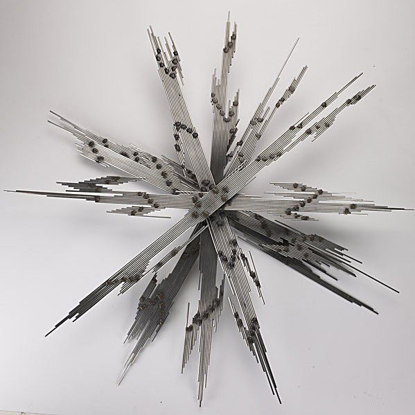 STYLE OF CURTIS JERE: STYLE OF CURTIS JERE; Abstract wall sculpture of a welded chrome rod on a central axis; 35'' x 32'' dia.