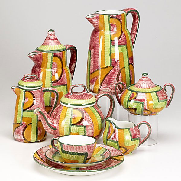 SECESSIONIST WHITE STONEWARE: SECESSIONIST WHITE STONEWARE; Tweny-one pieces sponge-decorated with geometric design includes: teapot, two coffee pots (one missing lid), creamer, sugar, covered creamer, five tea cups and saucers, f