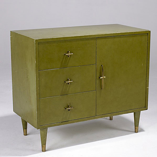 GROSFELD HOUSE: GROSFELD HOUSE; Enameled wood cabinet with three drawers and single door concealing interior shelf, with brass cruciform pulls, and brass-capped feet; Grosfeld House metal tag; 31 1/2'' x 36'' x 18 3/