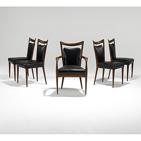 ERNO FABRY: ERNO FABRY; Set of five sculpted walnut dining chairs; Unmarked; Armchair: 37'' x 23 1/2'' x 24''