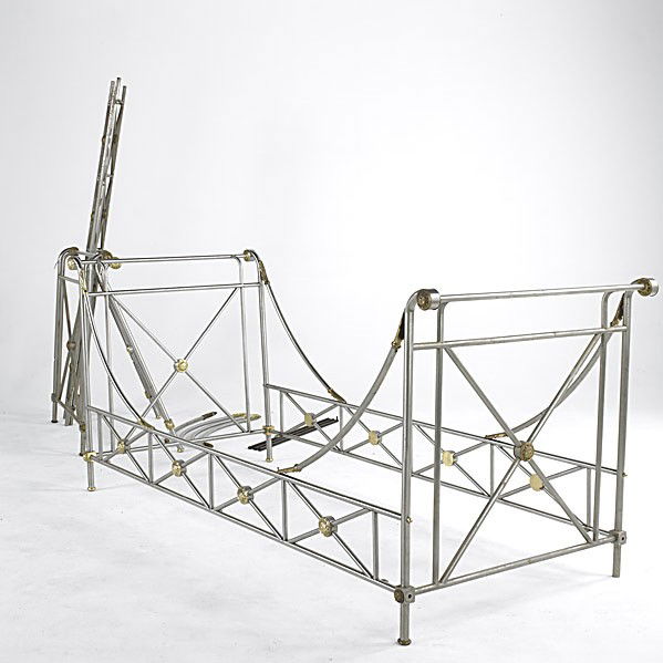 MAISON JANSEN: MAISON JANSEN; Brushed steel bed frames with decorative brass mounts; Some missing hardware; 40'' x 88'' x 38''