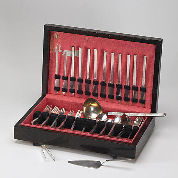 WMF: WMF; Partial silver plated flatware service for ten includes: ten knives, two butter knives, ten dinner forks, twelve salad forks, five table spoons, fourteen tea spoons, three fish forks, two serving