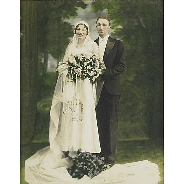 FIVE VINTAGE PRINTS & PHOTOS: VINTAGE PRINTS AND PHOTOS; Five works (framed): hand-colored wedding portrait, c. 1920; Two circular engravings after Cote; Chromolithograph after Maxfield Parrish; Off-set image of a woman; Largest 1