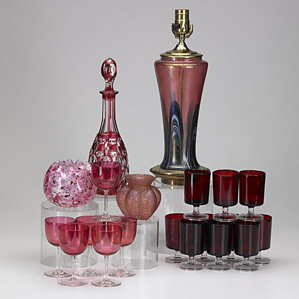 20TH C. ART GLASS GROUPING: 20TH C. ART GLASS GROUPING; Twenty pieces include pulled glass lamp base, short lobed vase, eight ruby juice glasses on clear bases, etc. Tallest: 18''