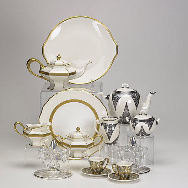 MINTON, HUTSCHENREUTHER, LENOX: MINTON, HUTSCHENREUTHER, LENOX; Two gold decorated plates, two Lenox tea sets, one with silver overlay, two silver overlay chocolate cups and two Rockwell silver overlay glass candlesticks; Tallest: 6