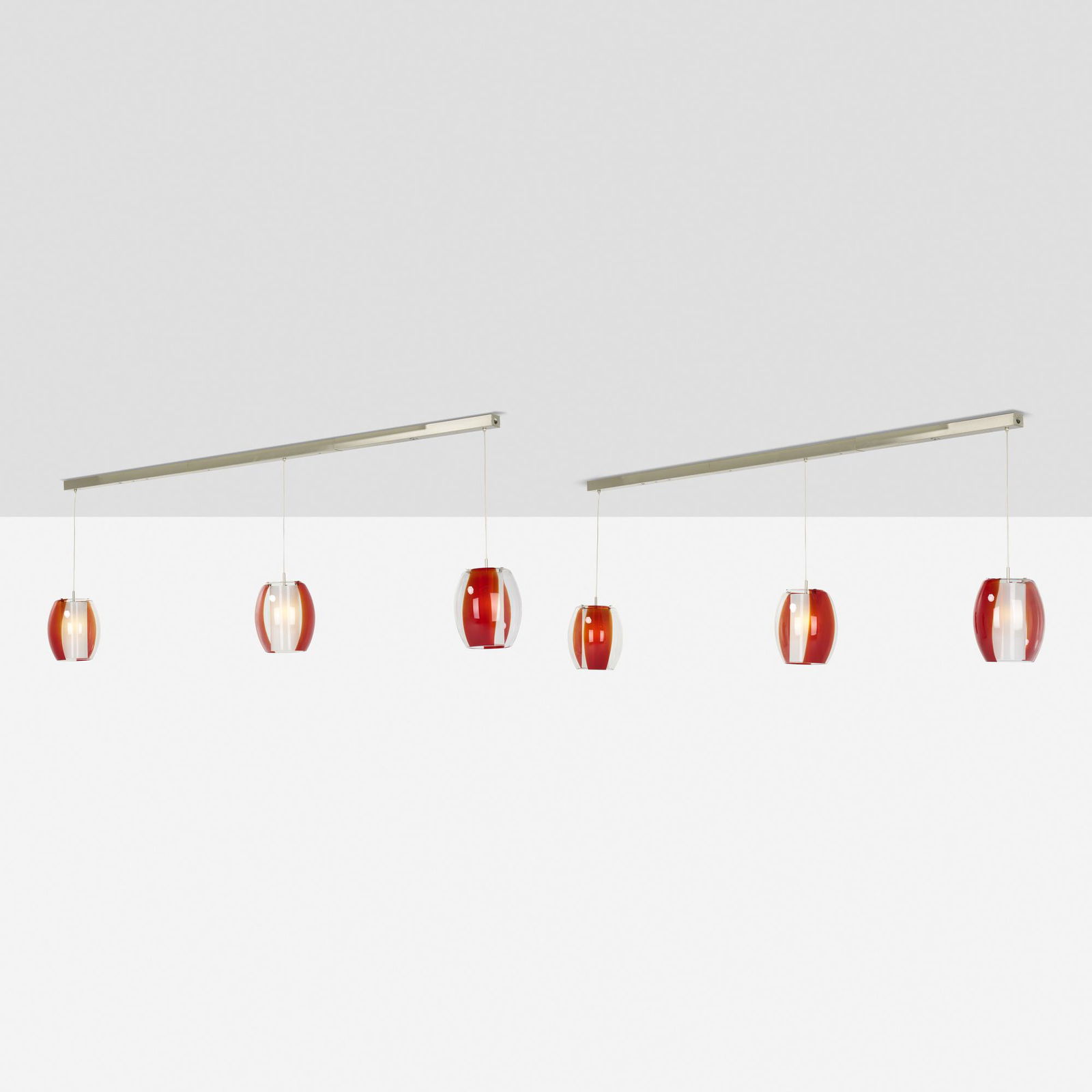 La Murrina, Pendant lighting system: La Murrina Pendant lighting system Italy, late 20th centuryblown glass, plastic, stainless steel 35 h × 102 w × 8.5 d in (89 × 259 × 22 cm) Each track features three pe