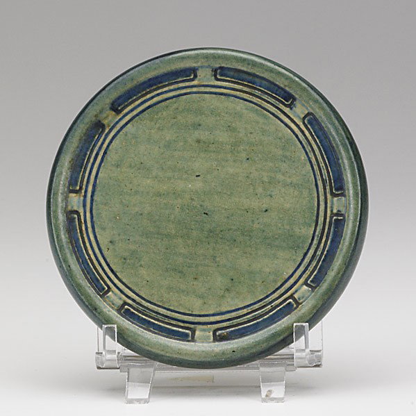 MAY LOUISE DUNN; NEWCOMB COLLEGE: MAY LOUISE DUNN; NEWCOMB COLLEGE; Transitional trivet, 1910: Marked NC DQ17 JM B, artist cipher; 4 1/4'' dia.
