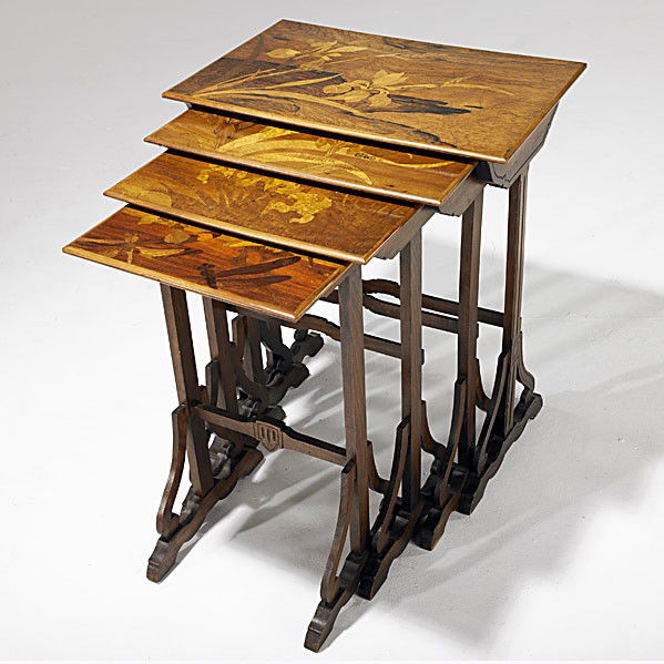 GALLE: GALLE; Set of four mahogany nesting tables with inlaid tops; Three of four signed; Largest: 28'' x 22 1/4'' 14 3/4''