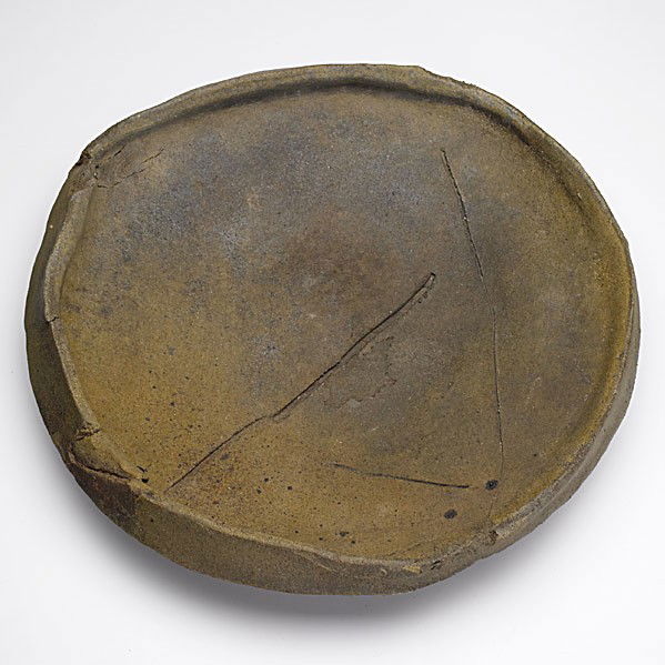 PETER VOULKOS: PETER VOULKOS; Anagama-fired stoneware charger, 1982; Provenance: Peters Valley Craft Center, Layton, New Jersey; Signed and dated; 5'' x 21''