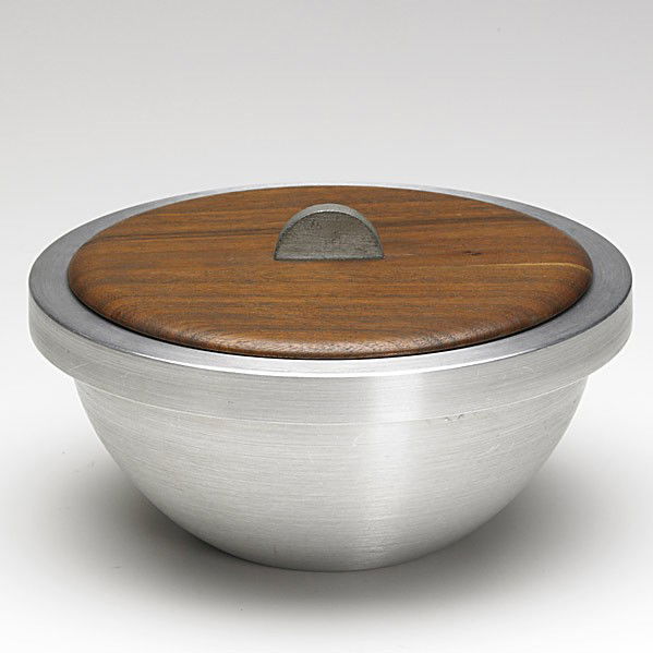 RUSSEL WRIGHT; RUSSEL WRIGHT INC.: RUSSEL WRIGHT; RUSSEL WRIGHT INC.; Spun aluminum and walnut lidded bowl, 1930's; Stamped Russel Wright; 4 1/2'' x 8 1/2''