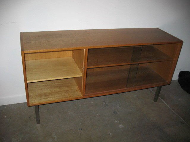 FRANZ EHRLICH; DEUTSCHE WERKSTAETTEN: FRANZ EHRLICH; DEUTSCHE WERKSTAETTEN; Group of four oak and metal cabinets, 1950's (three pictured); Smallest has Deutsche Werkstatten paper label; Largest 53 1/2'' x 62 1/4'' x 17 3/4'', second cabin
