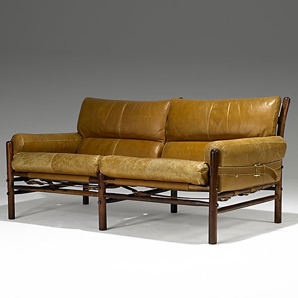 ARNE NORELL: ARNE NORELL; Jacaranda, brass and leather sofa; Partial label; 29'' x 64'' x 34''